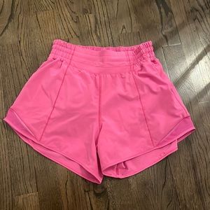 sonic pink, size four, high rise, 4 inch shorts. barely worn, look brand new.
